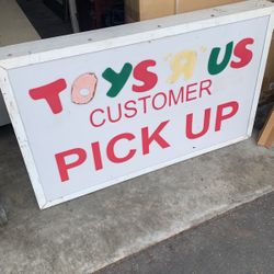 vintage toys R Us sign backlit 