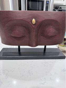 Buddha face table top statue