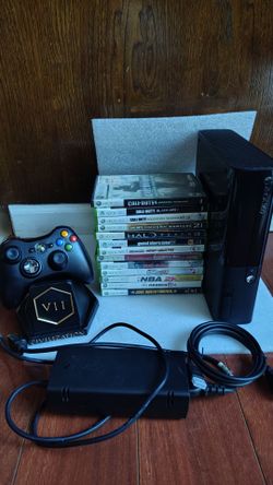 Xbox 360 e 250 gig hard drive and 13 games One controller