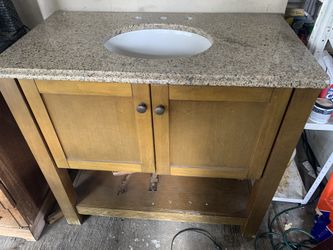 Bathroom vanity with granite counter. Never installed .