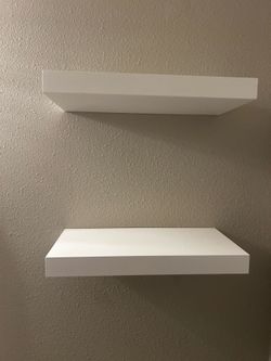 2 white shelves