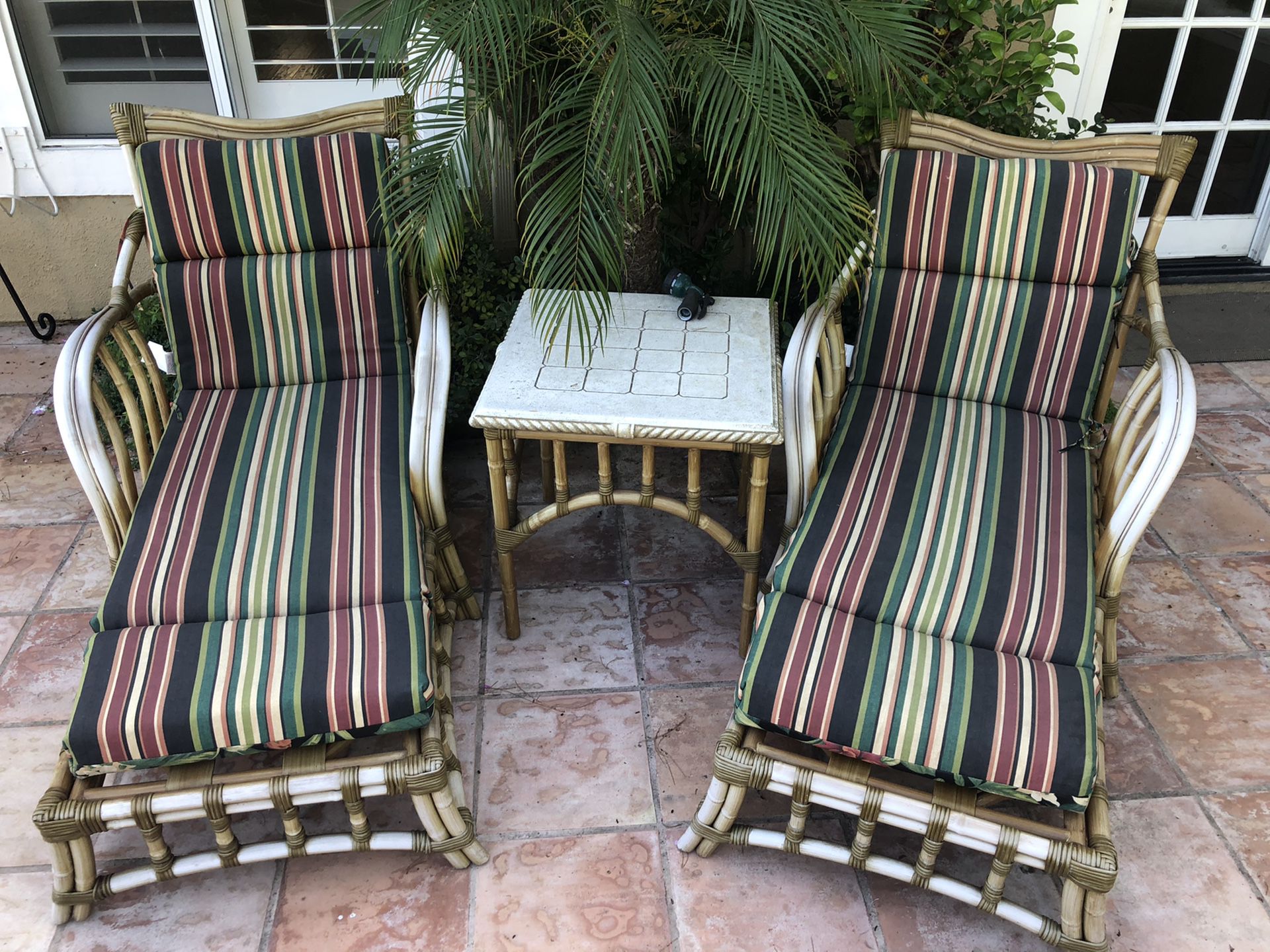 Outdoor patio lounge chairs and table