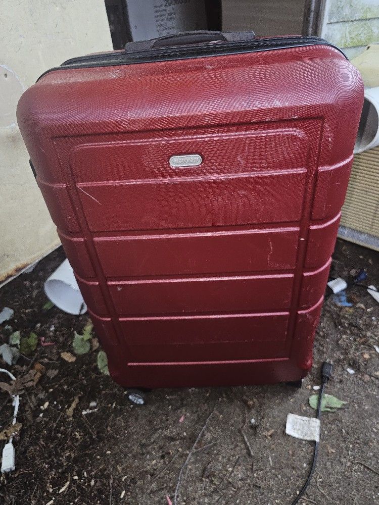 Price Is Firm.. Large Hardcover Swivel Luggage