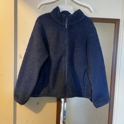 UNIQLO children's long pile fleece zip-up jacket in navy blue. Suitable for 7-8 years old / size 130.  • Brand: UNIQLO • Size: Marked size 7-8 years o