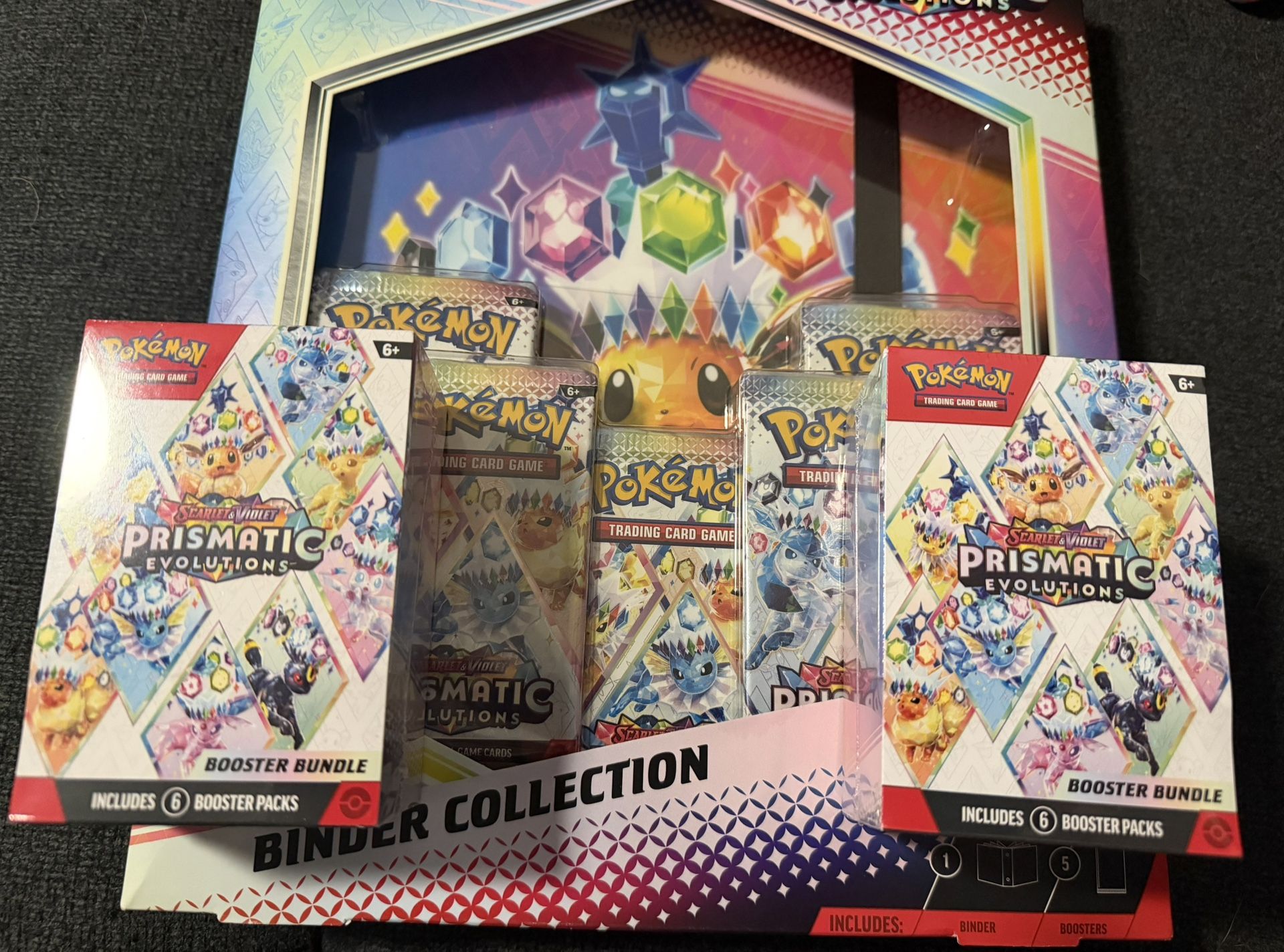 Pokémon - Prismatic Evolutions - Binder & Booster Bundle
