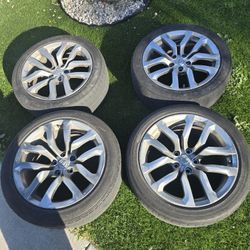 2012  18 inch Nissan rims and tires