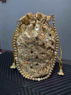 Raw silk potli bag / clutch / purse