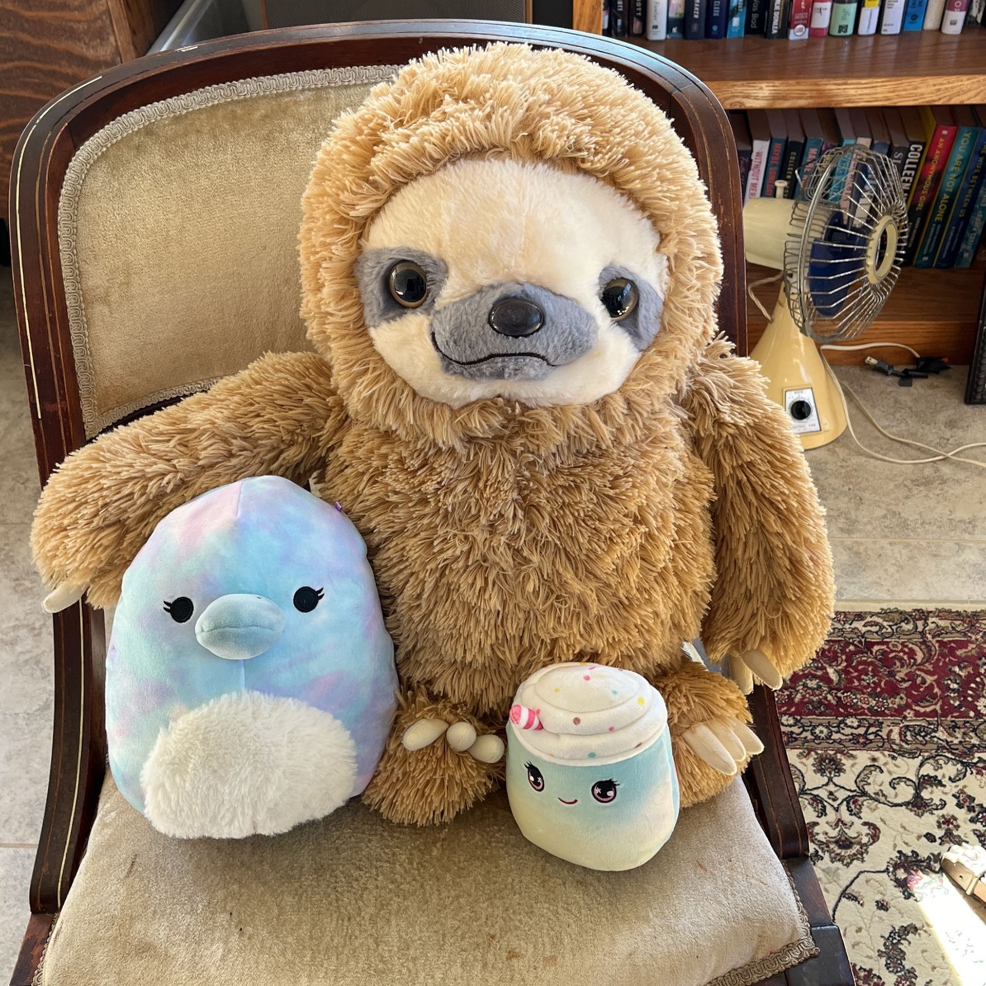 Stuffy Madness.  One medium and two smaller stuffed animals.