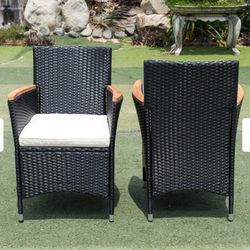 4-Piece Patio Chairs Set with Cushions – Poly Rattan, Black  Upgrade your outdoor seating with this 4-piece patio chair set, crafted from durable blac
