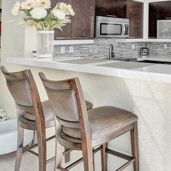 2 Counter-Height Leather Bar Stools – Used but in Good Condition