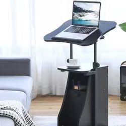 Adjustable standing desk on wheels with storage