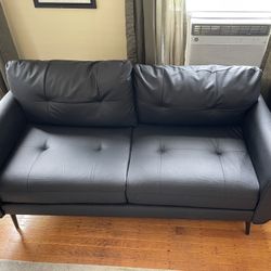 For Sale: New Black Faux Leather Loveseat