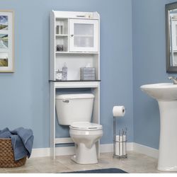 Space-saving cabinet fits over toilet