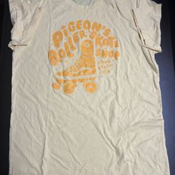 Pigeon’s Roller Skate Shop T-Shirt Size Medium Yellow 100% Cotton Short Sleeve