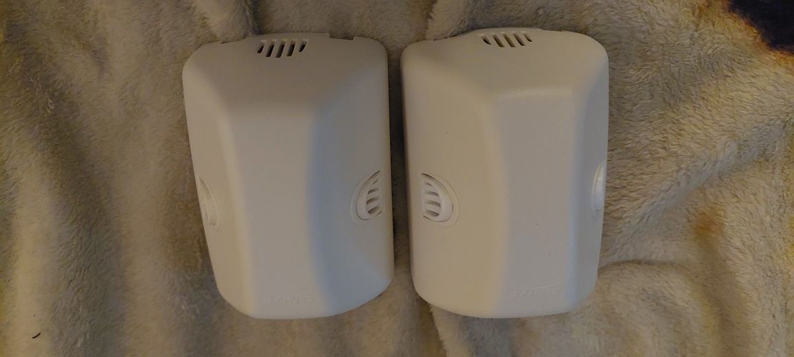 Set Of Two Outlet Covers And Cord Shortners