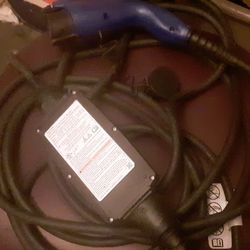 A Toyota Electric black /Blue Electric Car charger ?   A, Rav4 Part Price Is$ 73 Dollar's 😊