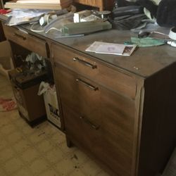 Antique wood 4 drawer desk w/ glass top