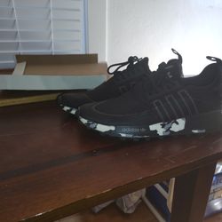 Adidias Black  and White  CAMO  Size 11.