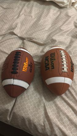 2 youth 12/14 size footballs