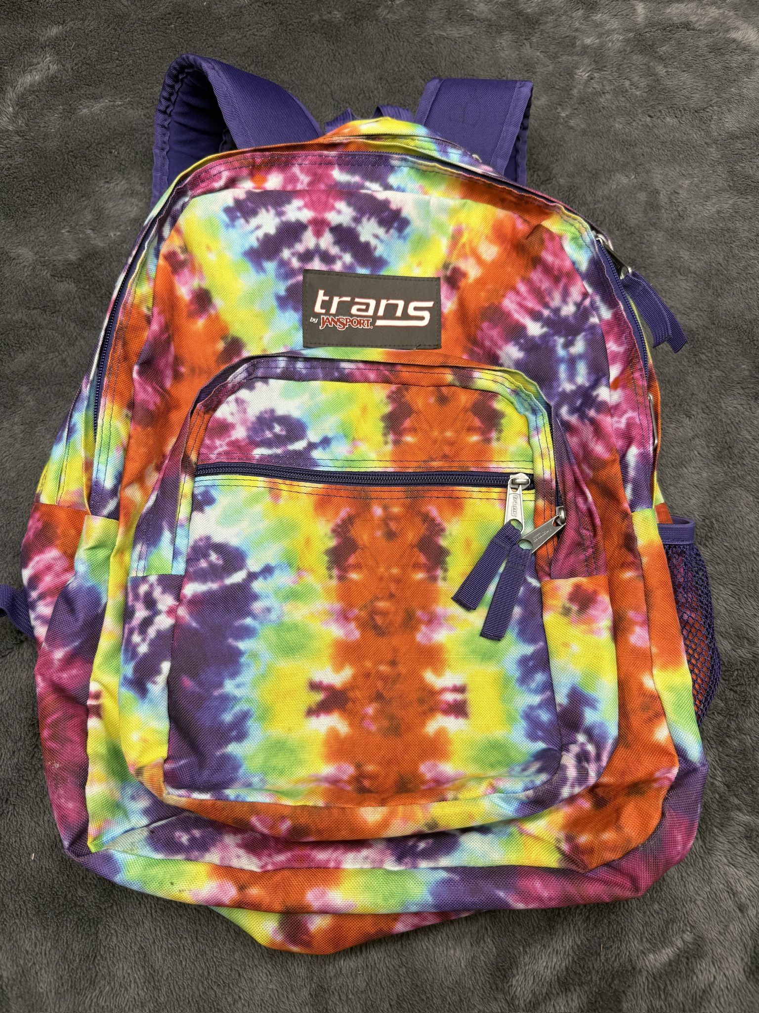 Colorful tie-dye Jansport backpack #kidcore  tie-dye, colorful, backpack, Jansport, kidcore, vibrant, rainbow, casual, scrunch, playful