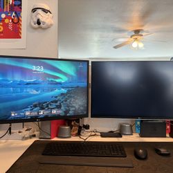 2 Monitors With The Monitor Arm