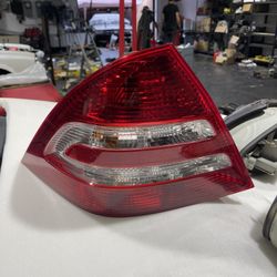 W(contact info removed) Mercedes C55 AMG Left Tail Light OEM