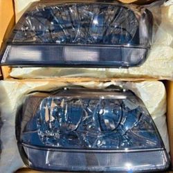 99-04 Jeep Grand Cherokee Headlights Luces Calaveras Micas Faros Faroles Headlamps Focos Headlamps