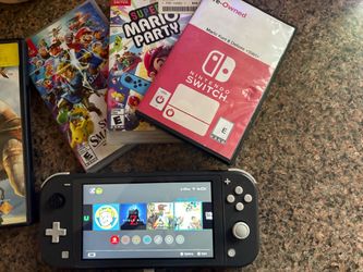 Used switch lite grey with games