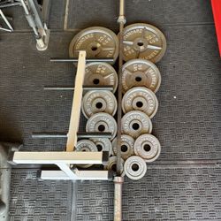 Olympic weights 255lbs total plus 7ft 45lbs bar plus weights tree firm price