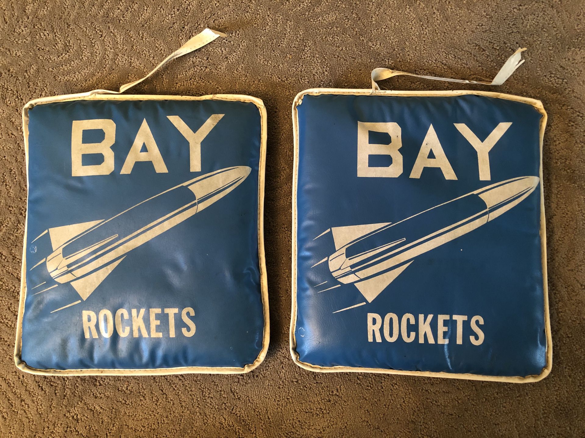 2 Vintage Bay Village rockets seat cushions