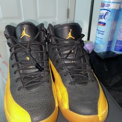 Black University Gold 12s Size 7