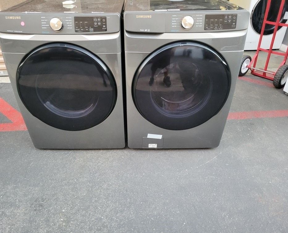 New Samsung front load washer In and  dryer