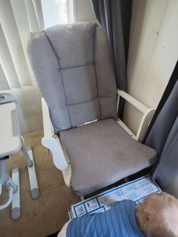 Glider chair with foot rest