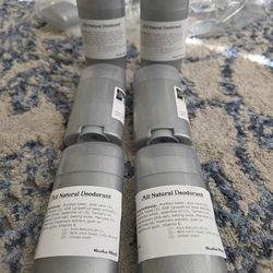 empty unused deodorant containers