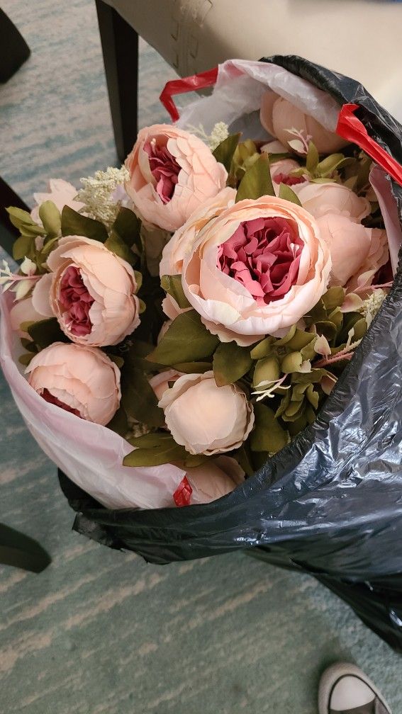 REALLY PRETTY FAKE FLOWERS AND A LOT OF THEM.