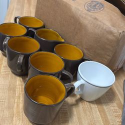 Eight coffee mugs