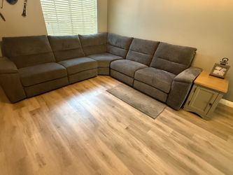 Sectional couch with electric recliner on ends