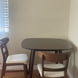 Breakfast table with two chairs
