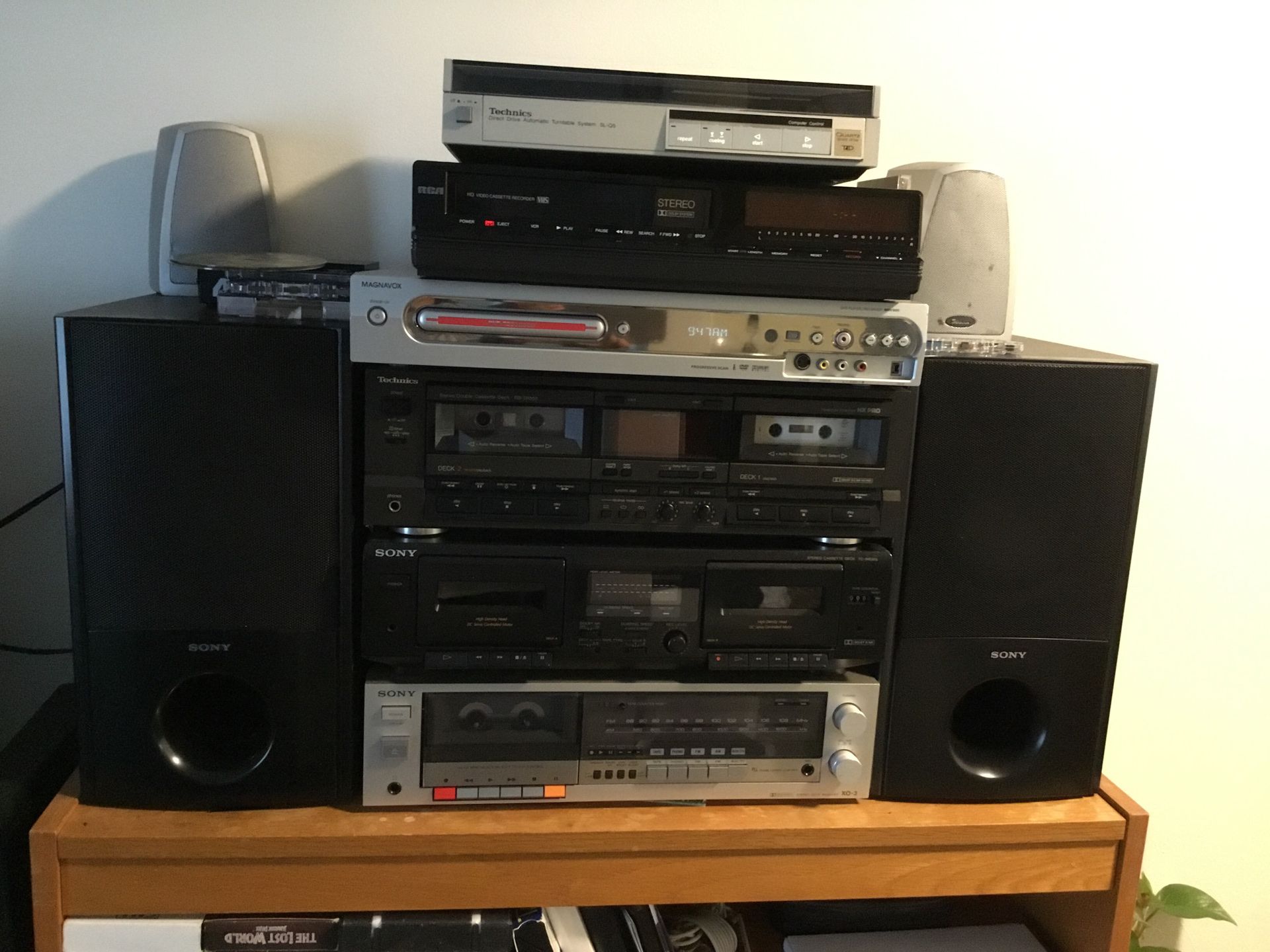Antique audio/video system including : digital record player, digital dvd/cd players with remote, VCR, digital double cassette players 2 no’s ( one a