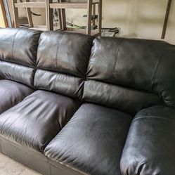 Almost New Black Faux leather  Sofa