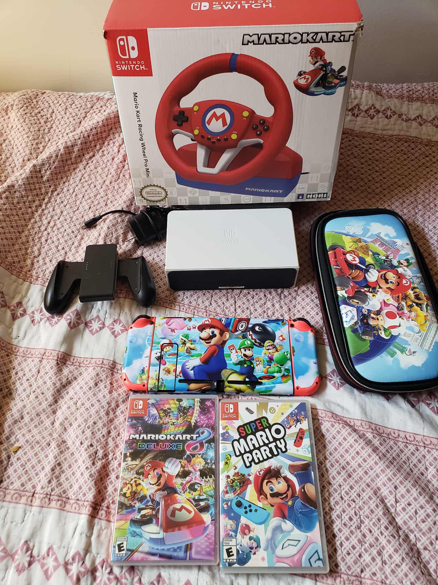 2020 V2 Nintendo Switch Unpatched & All Mario Custom with 2 Expensive Games, Mario case. Mario wheel & Pedels. $330. & i don't sell to crackheads FIRM