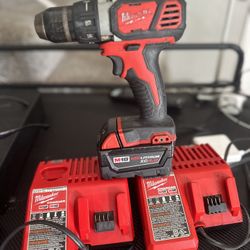 Milwaukee Drill Battery. And Two Chargers. 