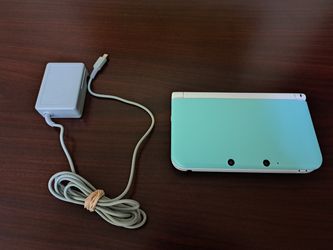 Nintendo 3DS XL LL White And Mint With Charger And 64GB CARD for in Bloomington, CA - OfferUp