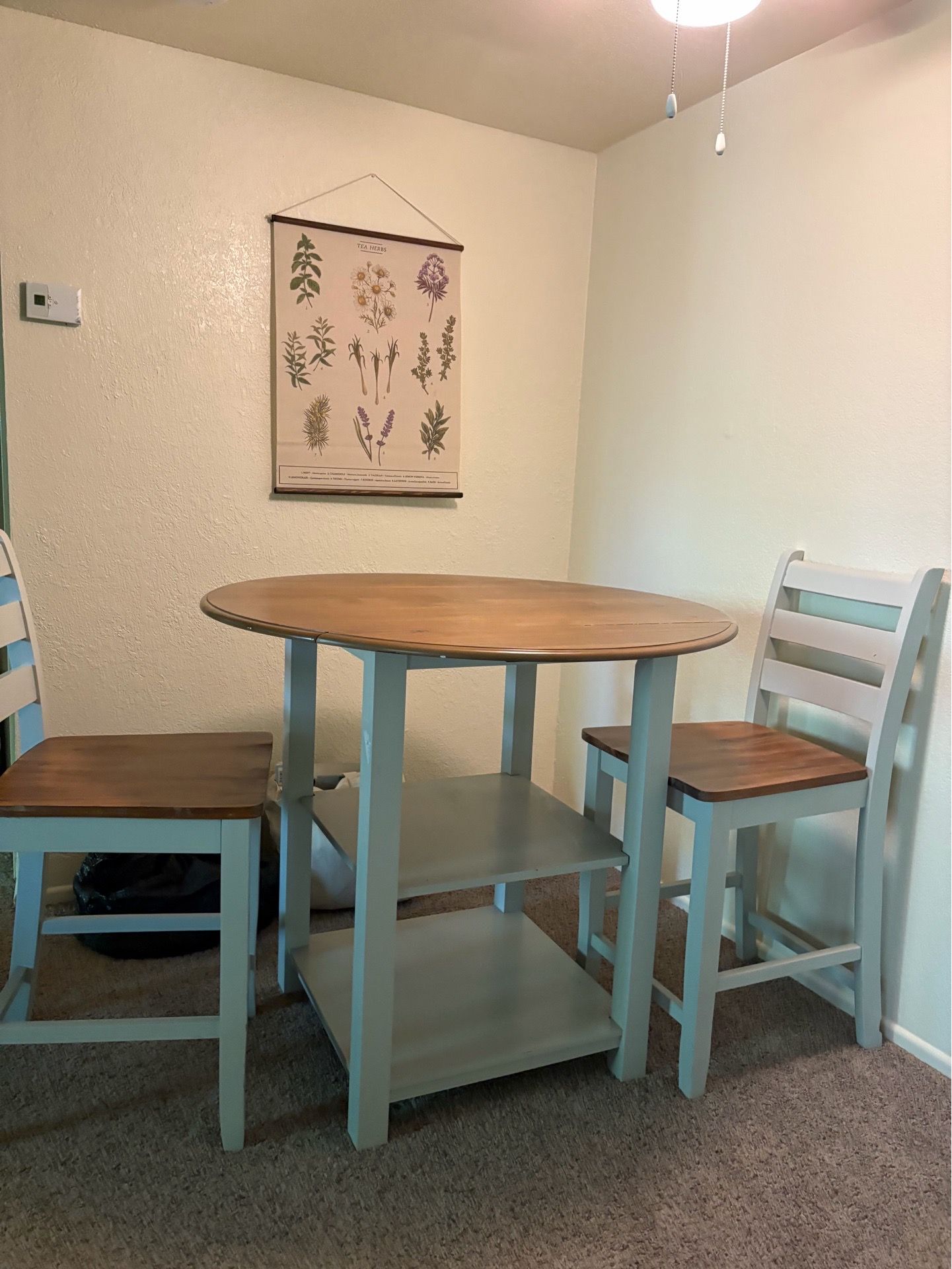 Small dining table with two chairs