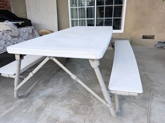Foldable party table with bench together