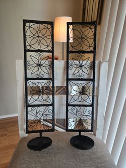 Pair decorative black metal candle holders