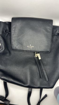 Kate Spade New York Black Leather Backpack in Next to New Condition.  Metal Spade & Leather Tassels 
