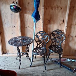 Wrought Iron Table And Chairs With Umbrella