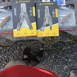 2 Leathermans And Two Swiss Army Knifes