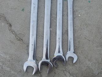 Husky large SAE ratcheting combination wrenches.